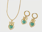 Conjunto de collar y pendientes con circonitas sintéticas verdes en forma de corazón y efecto ojo de gato, con cadena tipo «O»